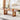 Living room coffee table walnut wood with rattan legs and rug top view