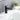 matte black single handle bathroom faucet running water into sink
