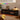Mood-enhancing LED TV stand with color control options via mobile app.