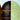 Interior of arched cabinet with dark wood shelves, contrasting the vibrant hand-painted exterior.