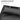Padded headrest pillow attached to black sling mesh for neck support