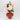 Peony flowers in sculptural terracotta ceramic vase close-up