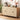Decorative storage cabinet styled with coffee maker and fruit tray
