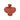 Red sculptural vase with fluted details top angled view
