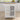 White kitchen island with wooden top in a modern kitchen setting