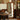 Solid cherry wood wavy floor mirror in vintage-style living room