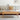 Solid oak lift top coffee table in living room setting with sofa and laptop