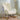 Teddy fabric rocking chair in a cozy living room setup with throw blanket