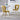Pair of yellow velvet bubble back chairs around white round table in modern dining room