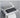 silver toilet paper holder with storage shelf and bathroom accessories