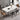 Stone top table set with six chairs