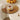 Cup of coffee and cookie on a stylish coffee table set