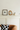 off white home decor with throw pillow, art frame, mirror.