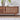 wooden media console with sliding doors