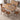 Wooden Dining Table elegantly occupying a dining space surrounded by stunning armed dining chairs